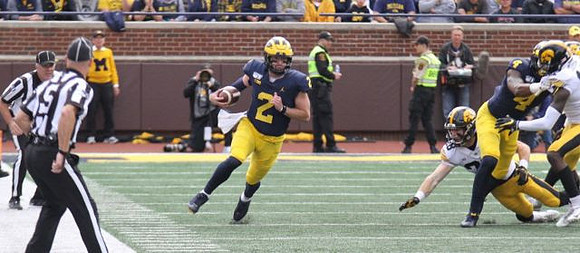 Shea Patterson (2) and Nico Collins (4)