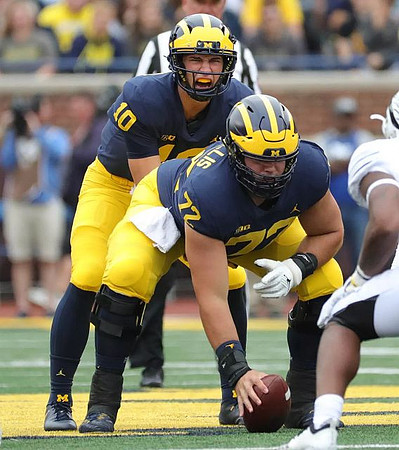 Dylan McCaffrey (10) and Stephen Spanellis (72)