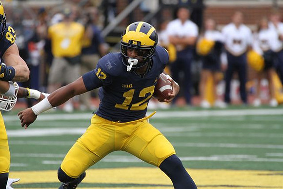 Zach Gentry (83) and Chris Evans (12)