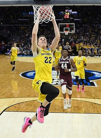 Duncan Robinson (22), Moritz Wagner (13), Charles Matthews (1), and Muhammad-Ali Abdur-Rahkman (12)