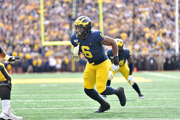 Josh Uche (6) and Josh Metellus (14)