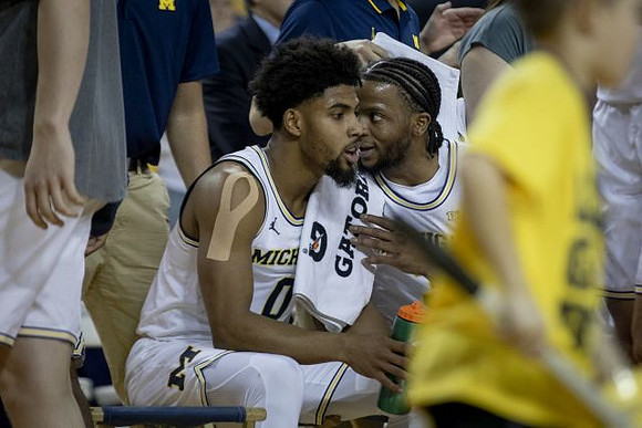 David DeJulius (0) and Zavier Simpson (3)