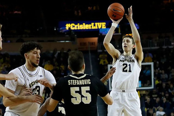 Brandon Johns Jr. (23) and Franz Wagner (21)