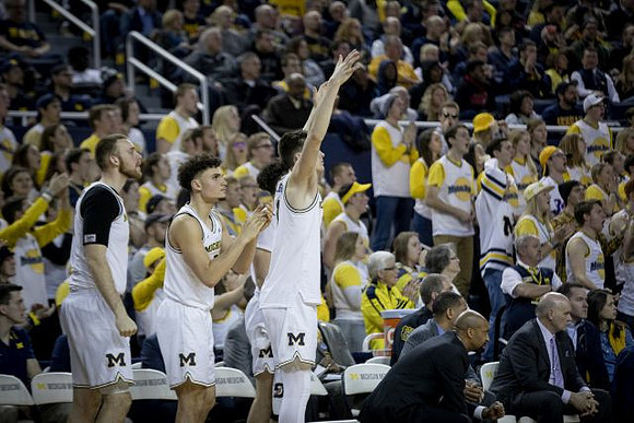 Austin Davis (51), Adrien Nunez (5), Colin Castleton (11), Saddi Washington, Howard Eisley, and Phil Martelli