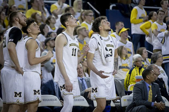 Austin Davis (51), Adrien Nunez (5), Colin Castleton (11), Brandon Johns Jr. (23), and Howard Eisley