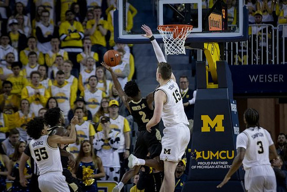 Eli Brooks (55), Jon Teske (15), and Zavier Simpson (3)