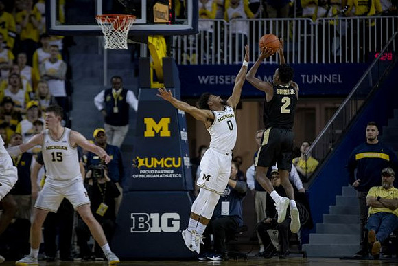 Jon Teske (15) and David DeJulius (0)