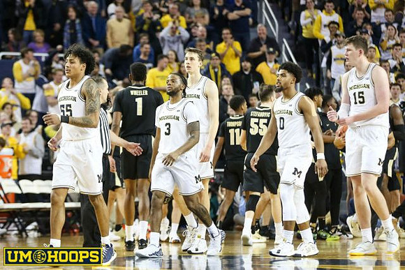 Eli Brooks (55), Zavier Simpson (3), Franz Wagner (21), David DeJulius (0), and Jon Teske (15)