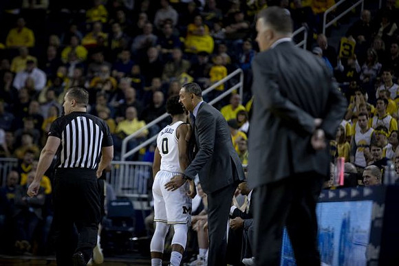 David DeJulius (0), Juwan Howard, and Purdue Head Coach Matt Painter
