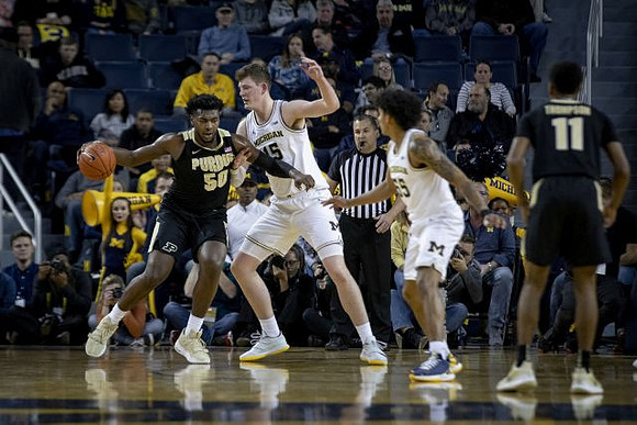 Jon Teske (15) and Eli Brooks (55)