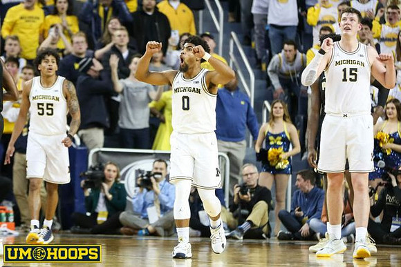 Eli Brooks (55), David DeJulius (0), and Jon Teske (15)