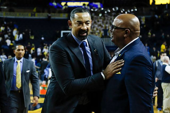 Howard Eisley, Juwan Howard, and Warde Manuel