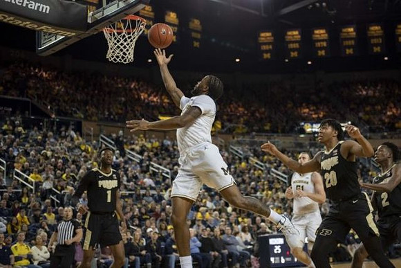 Zavier Simpson (3) and Austin Davis (51)