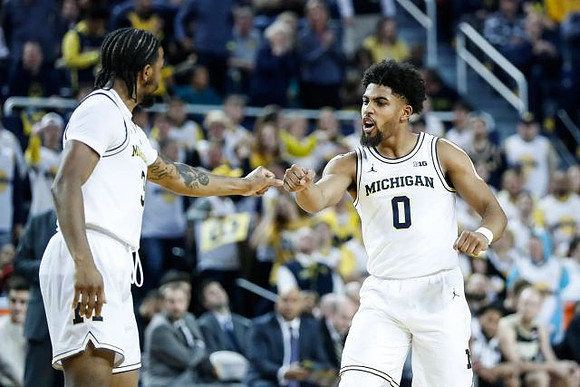 Zavier Simpson (3) and David DeJulius (0)