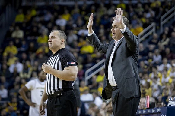 Zavier Simpson (3) and Purdue Head Coach Matt Painter