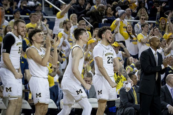 Austin Davis (51), Adrien Nunez (5), Colin Castleton (11), Brandon Johns Jr. (23), Howard Eisley, Saddi Washington, and Phil Martelli