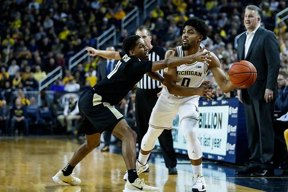David DeJulius (0) and Purdue Head Coach Matt Painter