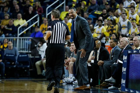 Juwan Howard, Saddi Washington, Howard Eisley, and Phil Martelli
