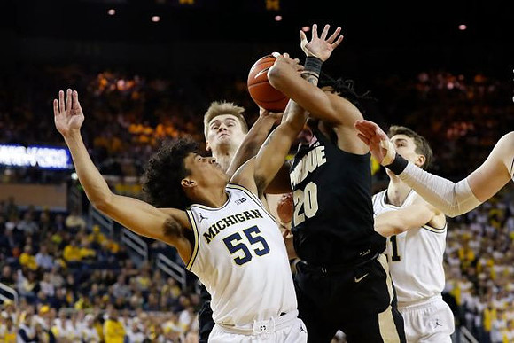 Eli Brooks (55) and Franz Wagner (21)