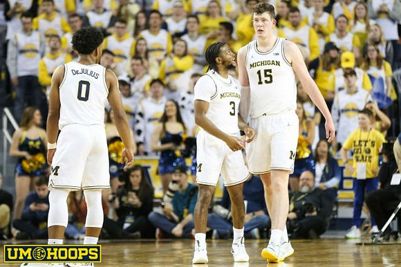 David DeJulius (0), Zavier Simpson (3), and Jon Teske (15)