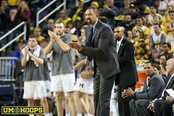 Luke Wilson (32), Austin Davis (51), Juwan Howard, Saddi Washington, Howard Eisley, and Phil Martelli