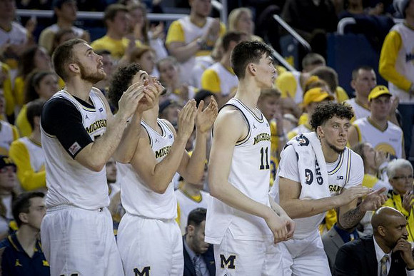 Austin Davis (51), Adrien Nunez (5), Colin Castleton (11), Brandon Johns Jr. (23), and Saddi Washington