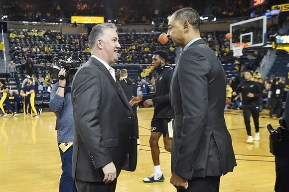 Purdue Head Coach Matt Painter  and Juwan Howard