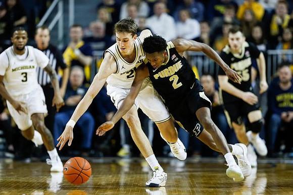 Zavier Simpson (3) and Franz Wagner (21)