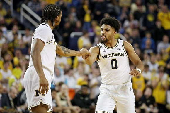 Zavier Simpson (3) and David DeJulius (0)