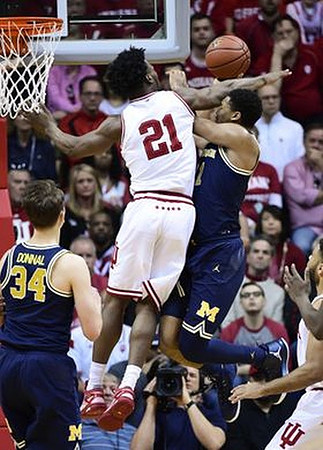 Mark Donnal (34) and Zak Irvin (21)