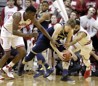 Xavier Simpson (3) and Moritz Wagner (13)