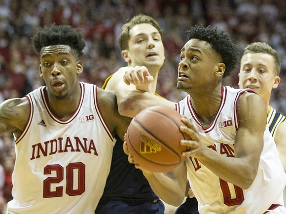 Mark Donnal (34) and Duncan Robinson (22)