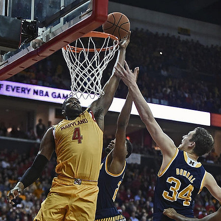 Zak Irvin (21) and Mark Donnal (34)