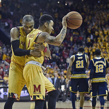 Zak Irvin (21) and Muhammad-Ali Abdur-Rahkman (12)