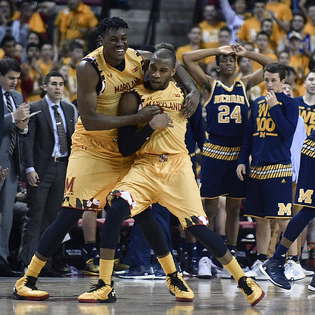 Aubrey Dawkins (24) and Andrew Dakich (11)