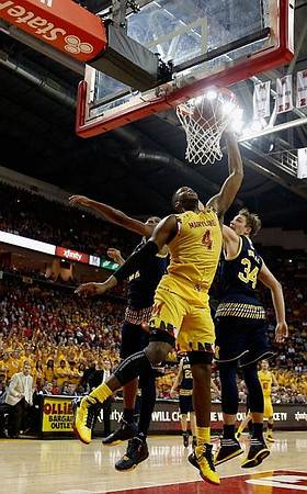 Zak Irvin (21) and Mark Donnal (34)