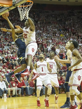 Zak Irvin (21) and Mark Donnal (34)