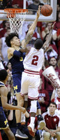 Zak Irvin (21) and D.J. Wilson (5)