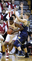 Moritz Wagner (13) and D.J. Wilson (5)