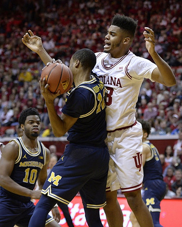 Derrick Walton Jr. (10) and Muhammad-Ali Abdur-Rahkman (12)
