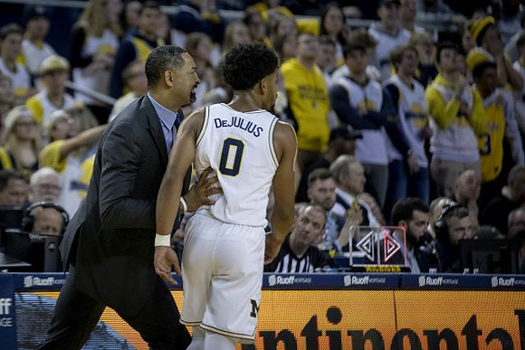 Juwan Howard and David DeJulius (0)