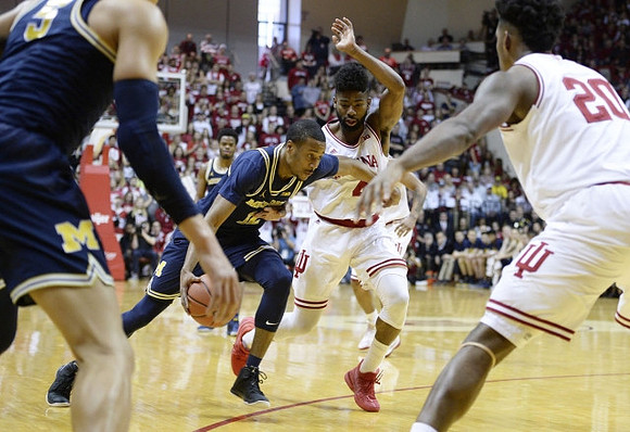 Muhammad-Ali Abdur-Rahkman (12) and D.J. Wilson (5)
