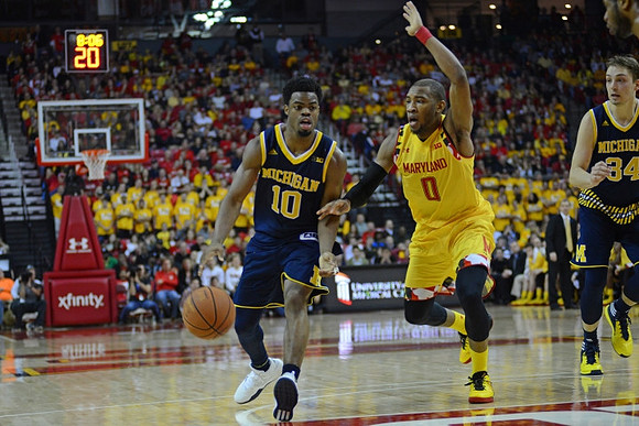 Derrick Walton Jr. (10) and Mark Donnal (34)