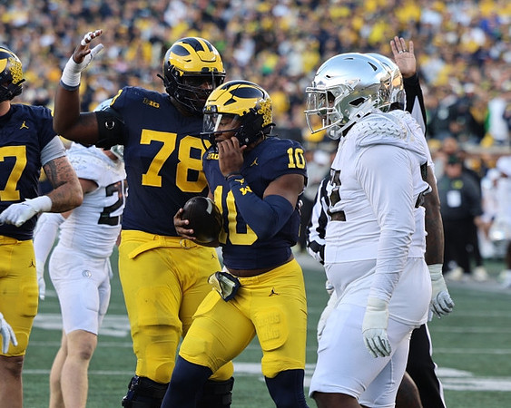 Myles Hinton (78) and Alex Orji (10)