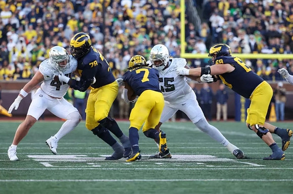 Myles Hinton (78), Donovan Edwards (7), and Josh Priebe (68)