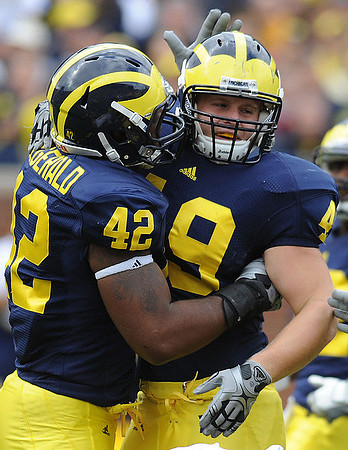 J.B. Fitzgerald (42) and John McColgan (49)