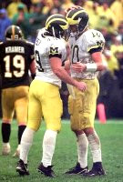 Tom Brady (10) and Jay Feely (49)