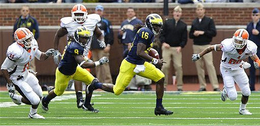Martavious Odoms (9) and Denard Robinson (16)