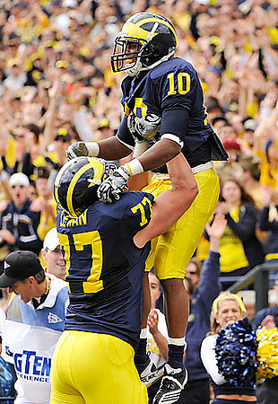 Taylor Lewan (77) and Jeremy Gallon (10)