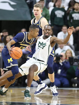 Muhammad-Ali Abdur-Rahkman (12) and Moritz Wagner (13)